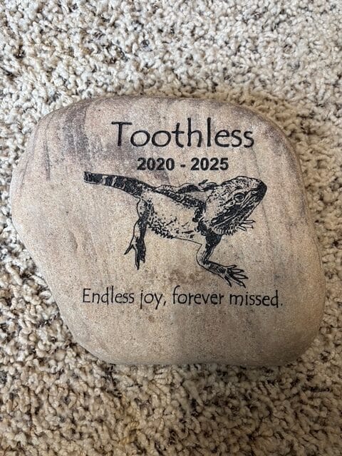 a engraved stone on a carpet